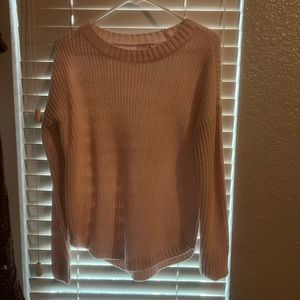 This is a light pink sweater, perfect for nice occasions and is a size S
